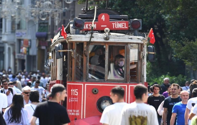 People walk on a street in Istanbul, Turkey