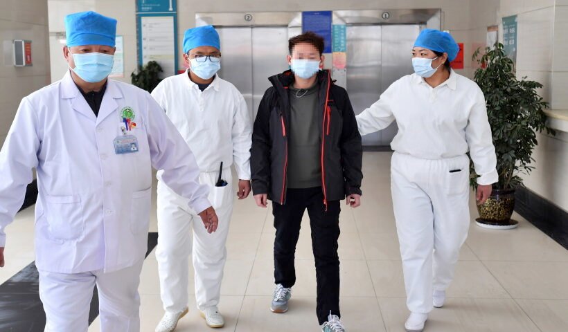 LHASA, Feb. 12, 2020 (Xinhua) -- The cured patient (2nd R) walks with medical staff at the Third People's Hospital of Tibet, in Lhasa, capital of southwest China's Tibet Autonomous Region