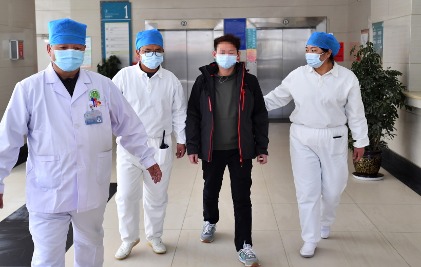 LHASA, Feb. 12, 2020 (Xinhua) -- The cured patient (2nd R) walks with medical staff at the Third People's Hospital of Tibet, in Lhasa, capital of southwest China's Tibet Autonomous Region