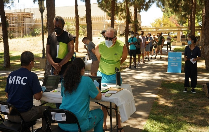 People wait to be vaccinated at a monkeypox vaccination site in Los Angeles, California, the United States