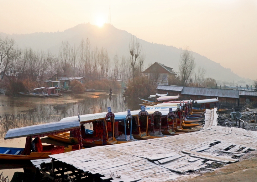 Srinagar: A view of Shikaras seen at the Dal Lake on a cold day, in Srinagar on Wednesday,