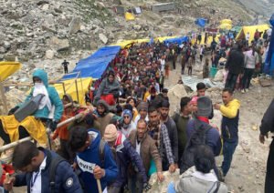 Ganderbal: Pilgrims in large numbers stand in queues during their Amarnath Yatra at Baltal in Ganderbal district on