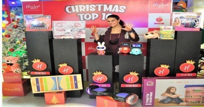 New Delhi, Dec 11 (UITV/IANSlife) Imaginative role-play toys top the charts, allowing kids to #believeinmagic again this Christmas. Hamleys, India's leading toy retailer for children, announced the top 10 toys for Christmas 2021, unveiling this collection for the first time. With kids having spent the majority of the past 2 years indoors, and engaging with virtual platforms and screens, this Christmas collection prioritises in-person role play and creativity, allowing kids to create imaginary worlds and bring back the magic of believing in Christmas. Top trends for this season include AI enabled learning gadgets, dollhouses for immersive play, and reversible plush toys, among other products. The super learning robo MIKO, the Pioneer Drone, the hi-life playful furnished dollhouse and Infiniti hoverboard are also the key highlights of this festive season's must-haves, and combine clever edu-tech and fantasy to build, role-play and create. The coveted list of the season's most exciting toys was unveiled by actor and mom Neha Dhupia at the world's first Hamleys Play Store at Jio World Drive BKC on 9th, amid a magical, festive party for leading mommy influencers and their children. Surrounded by Santa and his elves, Neha and popular mommy influencer Simone Khambatta unveiled the toys that are sure to stimulate children's imaginations and make playtime a more exciting experience. Neha had great fun tearing open the top 10 Christmas toys one by one, and expressed childlike glee at discovering each one of these unique gifts. She also hung out with the kids invited to the event in the Hamleys Play Area, and chattered and goofed around with Santa and the elves. RJ & TV personality Teejay Sidhu was also present at the event, apart from popular mom influencers like Shradha Virani (The Diaper Drama), Yuvika Abrol, and others. "Being a mom of two, juggling work, family, and everything else leaves me with little time for festive shopping! This Christmas is even more special for us with two little angels making our celebration even more special. Hamleys India launching their Christmas top 10 toys couldn't have come at a better time! Hamleys has always been my go-to destination to pick up super cute stuff and this time around I can't wait to shop for some fun and imaginative toys for our kids," said Neha Dhupia. Shah, Group Vice-President at Hamleys India, said, 'Hamleys -- The finest toy shop in the world, in India, has grown to be recognised as a trendsetter for all new experiences to look out for children. The brand sees high potential in the diverse India market and plans to launch 100+ stores in the coming year expanding the reach to 250+ stores in India by March 2023. This has been a special year for us, our brand new concept store Hamleys Play -- which focuses on the fun and play concept opened its first store in the world at Jio World Drive, Mumbai. Going by the response to the new concept, we are set to expand this concept to all major cities in the India in the coming year. The Christmas top 10 toys collection are available at Hamleys toy stores across the country, as well as on their website www.hamleys.in starting December 2021.