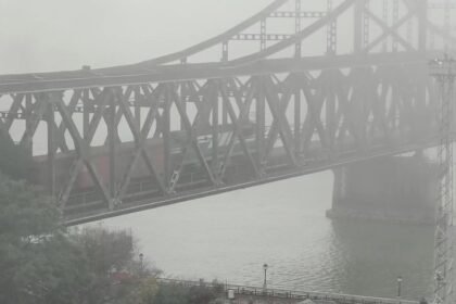 A freight train crosses the Sino-Korean Friendship Bridge