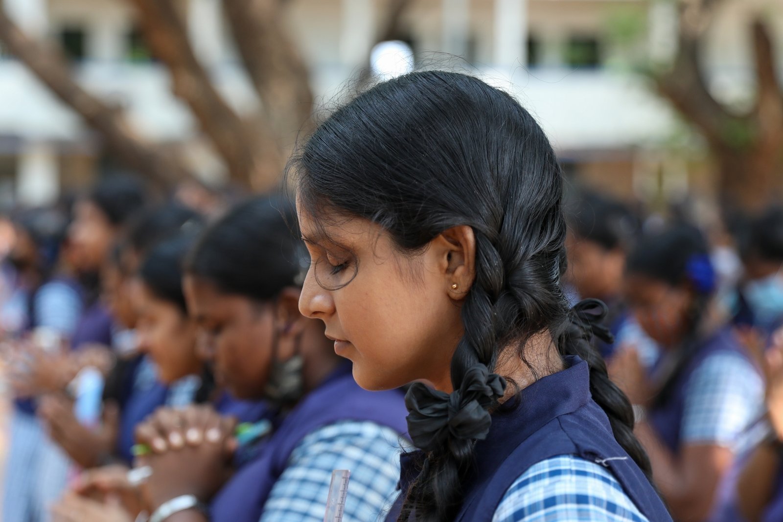 School students offer prayers before appearing in the HSC exams
