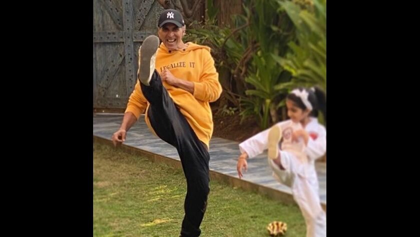 Akshay and daughter Nitara practicing Karate Kicks