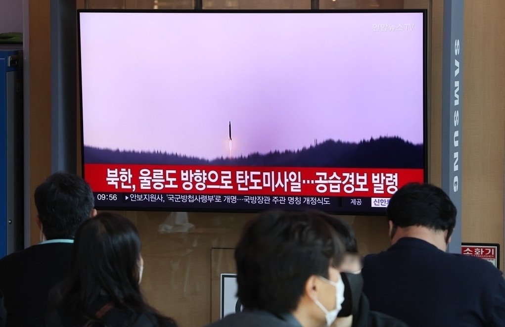 TV news footage on North Korea's firing of ballistic missiles