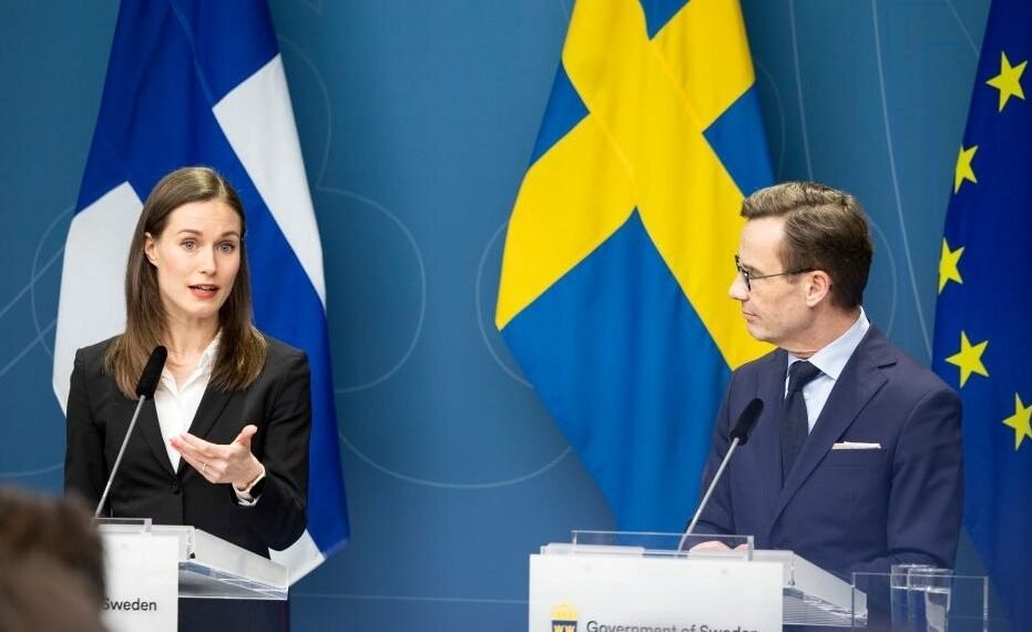 Finnish Prime Minister Sanna Marin (L) speaks at a press conference with Swedish Prime Minister Ulf Kristersson in Stockholm