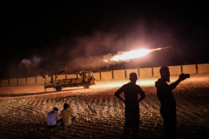 Members of the Turkish-backed Syrian National Army launch a long-range grad rocket targeting Syrian regime sites, in response to the killing of 14 civilians in the city of Al-Bab.