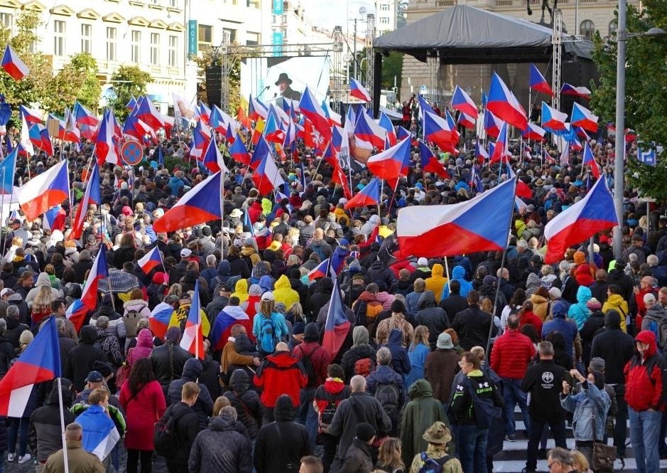 People take part in a demonstration at Wenceslas Square in Prague