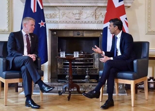 New Zealand Prime Minister Chris Hipkins and the UK's Rishi Sunak