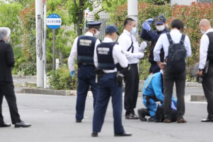 Police officers investigate