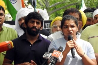 Wrestlers Bajrang Punia and Sakshi Malik address the Media