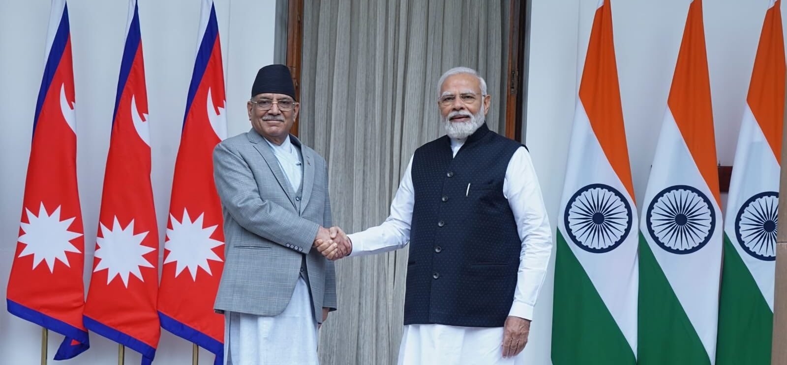 PM Narendra Modi greets PM cm Comrade Prachanda of Nepal