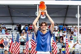 Winner Taylor Fritz poses with Atlanta Open trophy