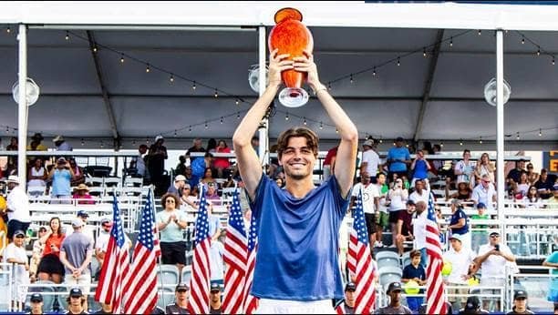 Winner Taylor Fritz poses with Atlanta Open trophy