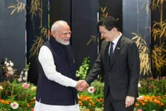 PM Modi and PM Lawrence Wong